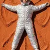 Starship passenger doing the snow angel on mars