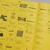 Yellow page with various logos, text, and a QR code, featuring brands like IKEA, Acne Studios, and others.